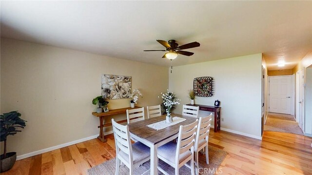 565 5th Ave, Orland, CA 95963 - dining space featuring a ceiling fan, baseboards, and light wood finished floors