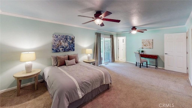 carpeted bedroom featuring ceiling fan and ornamental molding