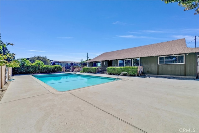 view of swimming pool featuring a patio