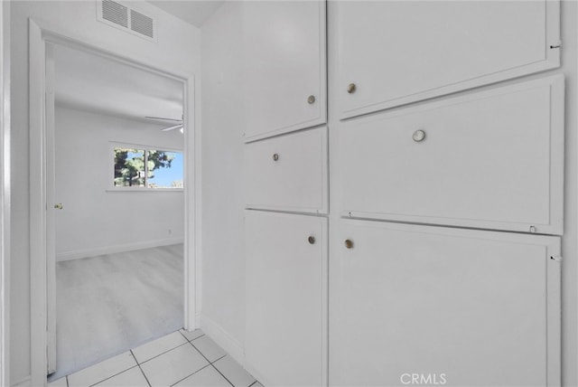 details featuring ceiling fan and tile patterned flooring