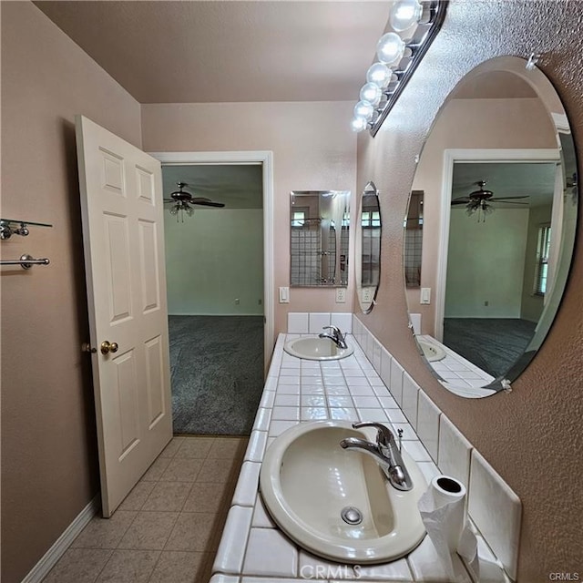 bathroom with vanity and tile patterned flooring