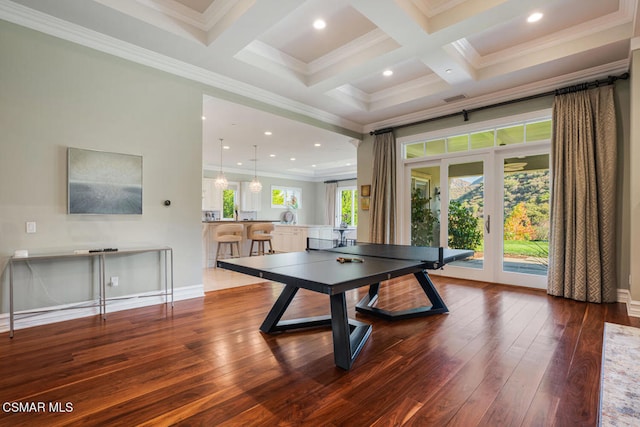 playroom with beamed ceiling, hardwood / wood-style flooring, coffered ceiling, and ornamental molding