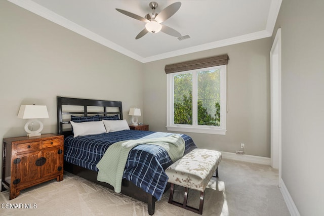 bedroom with ceiling fan, light colored carpet, and ornamental molding