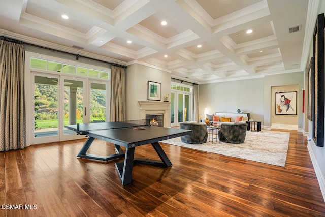 rec room featuring beam ceiling, crown molding, coffered ceiling, and hardwood / wood-style floors