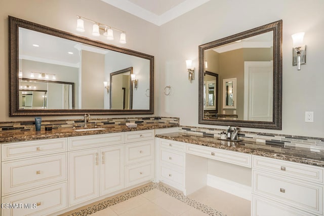 bathroom featuring crown molding, tile patterned floors, backsplash, and vanity