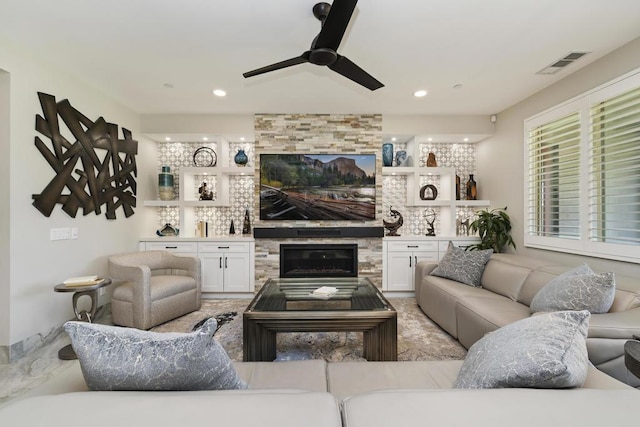 living room featuring ceiling fan