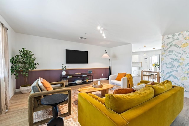 living room featuring light wood-type flooring