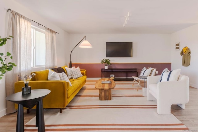 living room with light hardwood / wood-style flooring