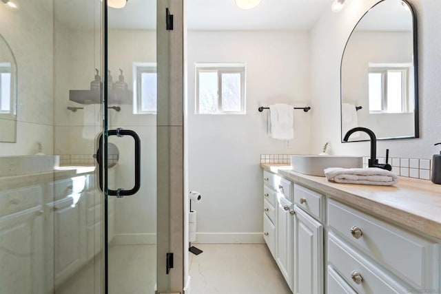 bathroom with vanity and walk in shower