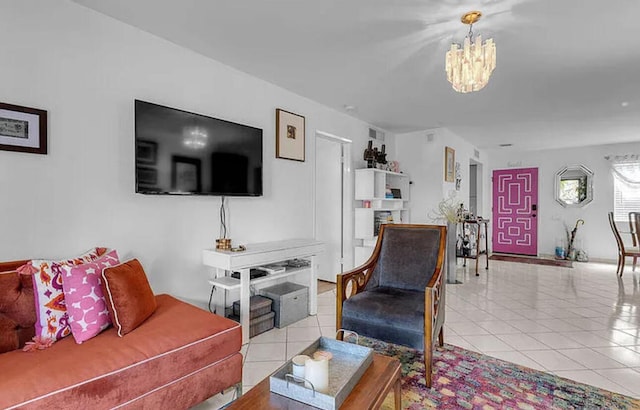 tiled living room featuring a notable chandelier