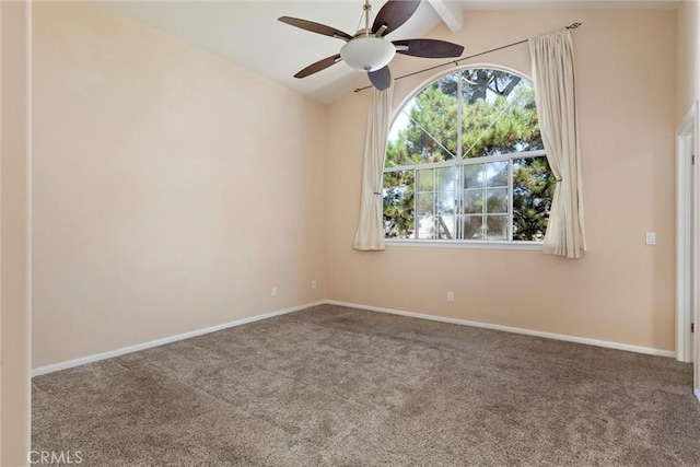 empty room with carpet flooring, vaulted ceiling with beams, and ceiling fan