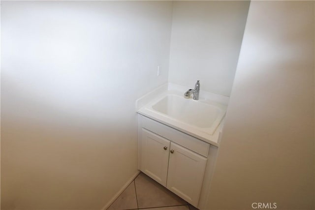 bathroom featuring tile patterned floors and vanity