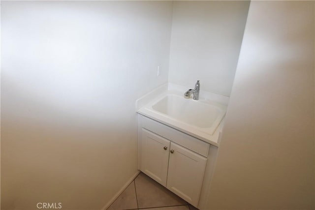 bathroom featuring vanity and tile patterned flooring