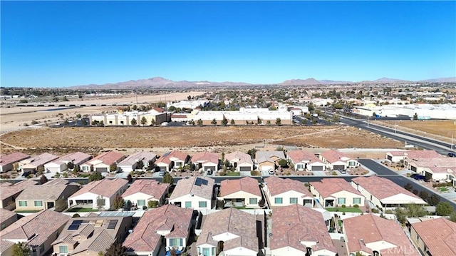 aerial view featuring a residential view and a mountain view