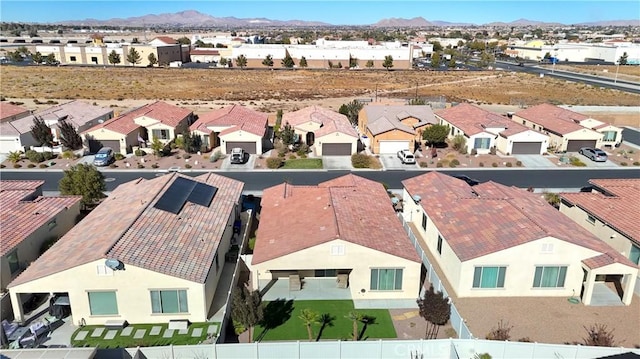 bird's eye view featuring a mountain view and a residential view