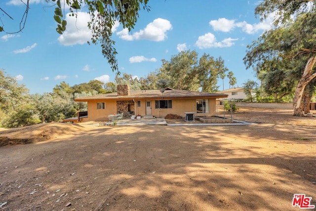 rear view of house with a patio area