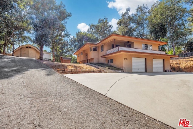 view of front of home featuring a garage