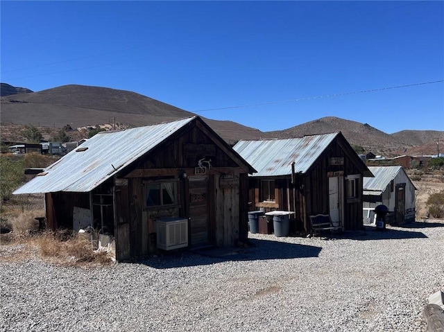 exterior space featuring a mountain view