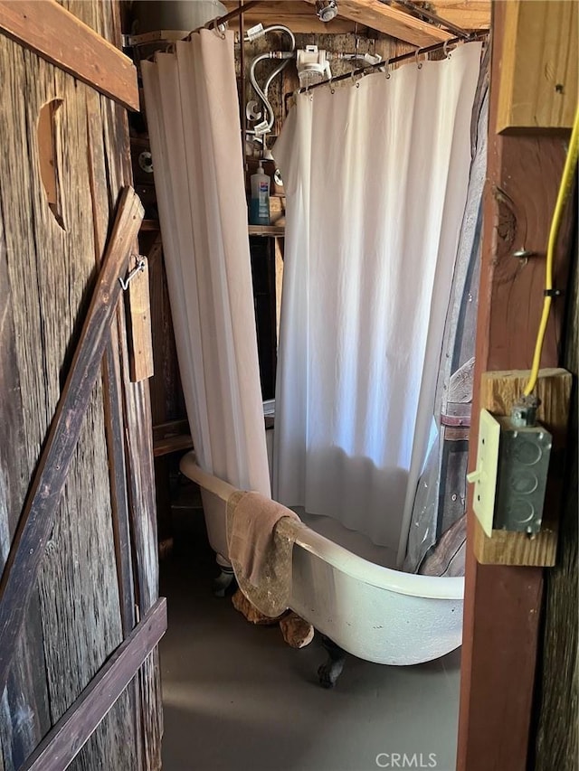 bathroom with concrete flooring