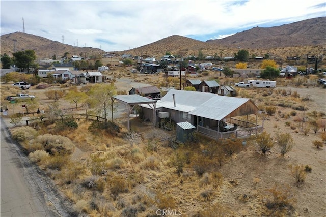 drone / aerial view featuring a mountain view