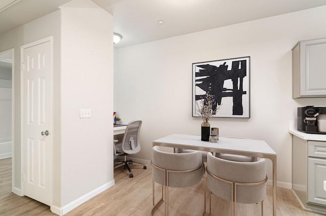 home office featuring light hardwood / wood-style floors