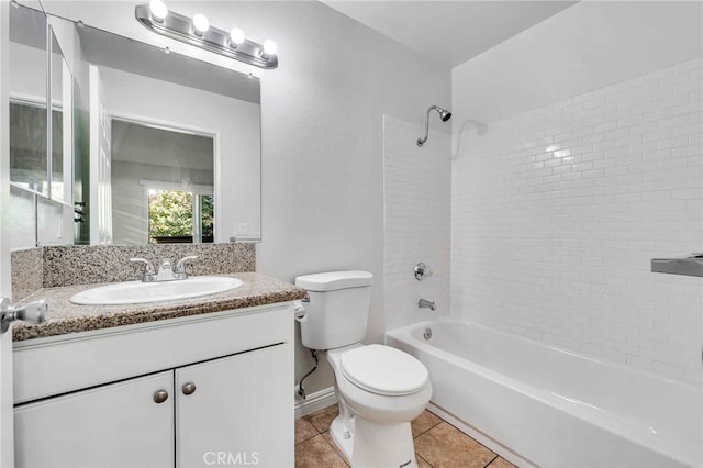 full bathroom featuring vanity, toilet, tile patterned flooring, and tiled shower / bath