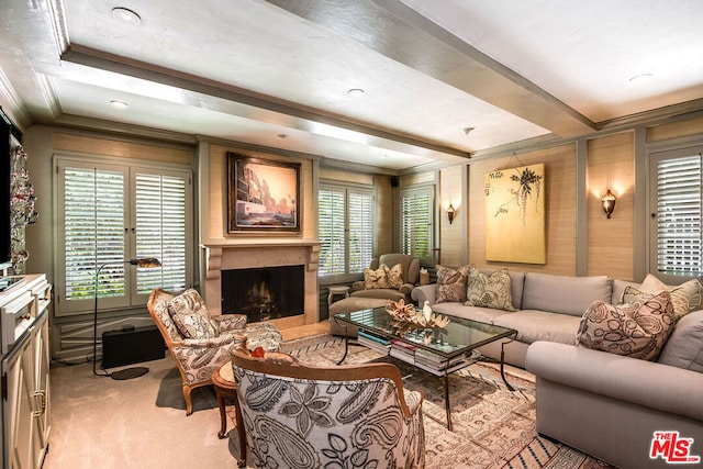 carpeted living room featuring crown molding