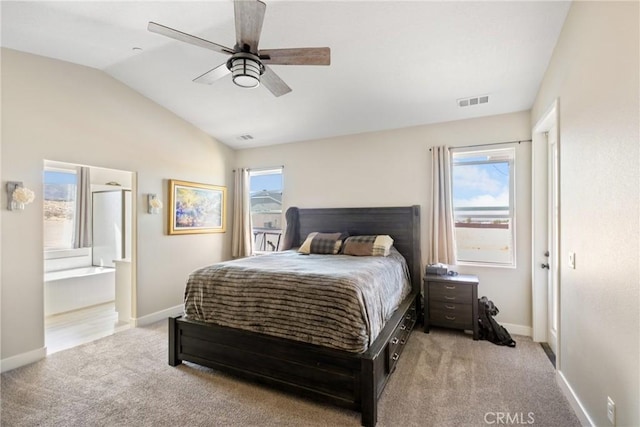 bedroom featuring multiple windows, ceiling fan, light carpet, and lofted ceiling