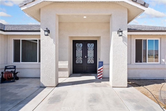 view of exterior entry with french doors