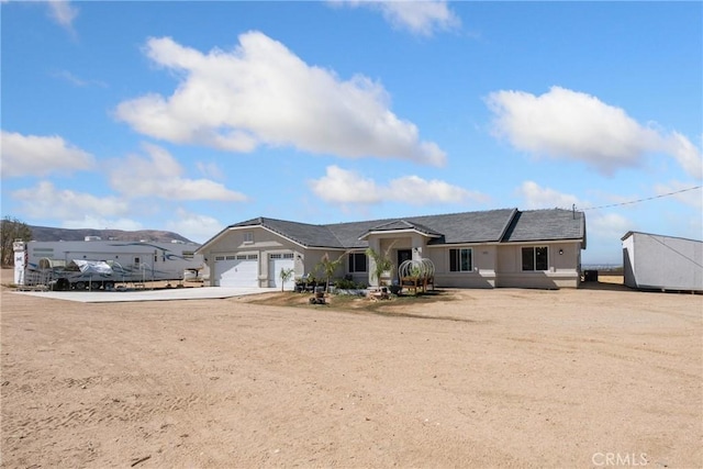 ranch-style house with a garage