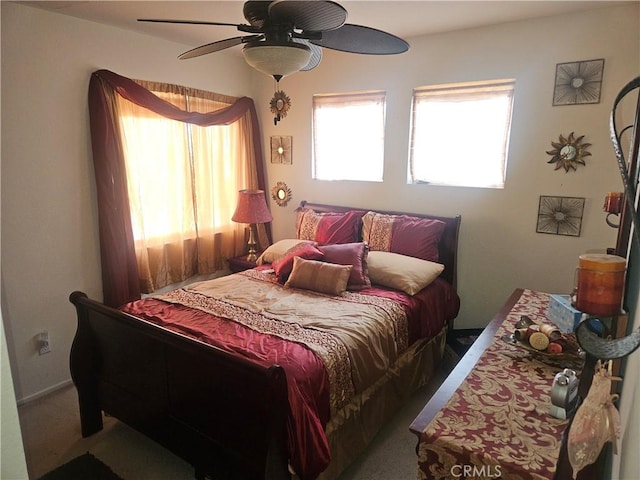 bedroom featuring carpet floors and ceiling fan