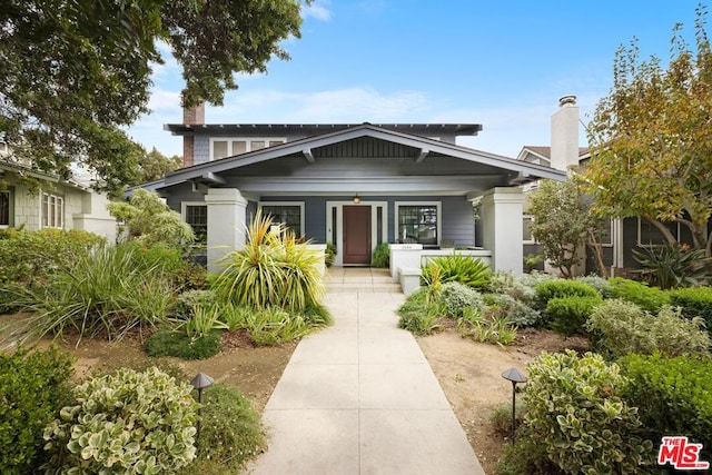 craftsman-style house featuring covered porch