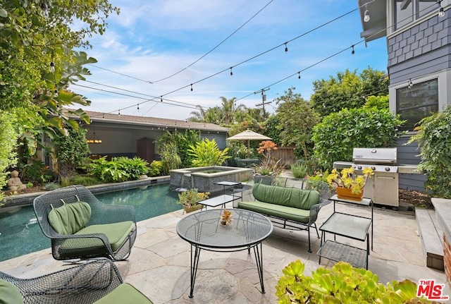 view of patio with outdoor lounge area, a swimming pool with hot tub, and grilling area