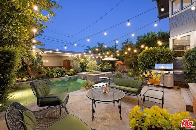 view of patio with a grill, a swimming pool with hot tub, and outdoor lounge area