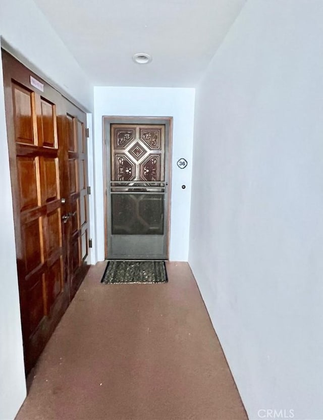 36 Camino De Flores Unit 69, Avalon, CA 90704 - hallway featuring carpet flooring