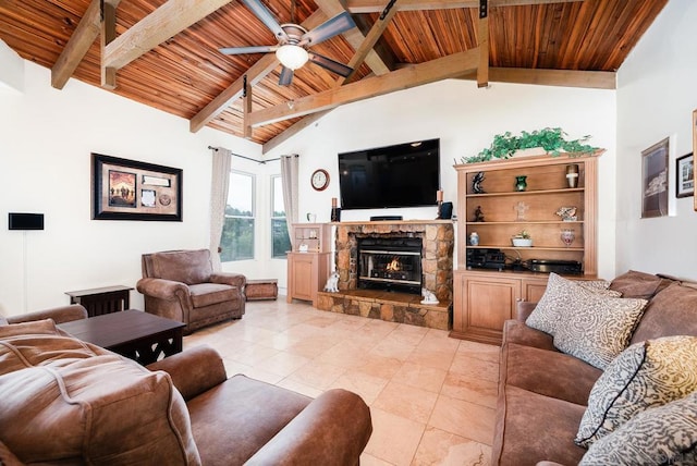 living room with a stone fireplace, beam ceiling, wooden ceiling, light tile patterned floors, and ceiling fan