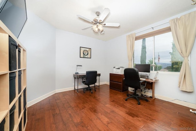 office with hardwood / wood-style flooring and ceiling fan