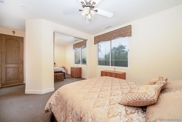 bedroom with a closet, carpet, and ceiling fan