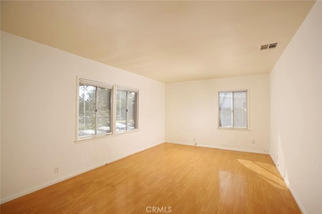 empty room featuring light wood-type flooring