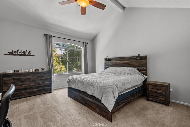 bedroom featuring light carpet, vaulted ceiling with beams, and ceiling fan