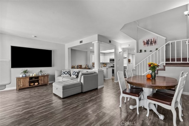 dining area with dark wood-type flooring