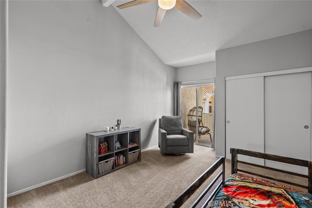 living area featuring vaulted ceiling with beams, carpet flooring, and ceiling fan