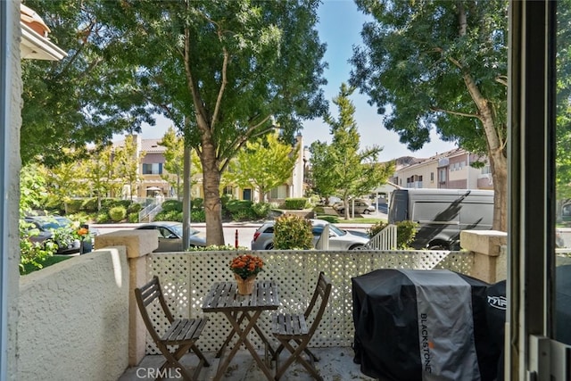 balcony featuring area for grilling