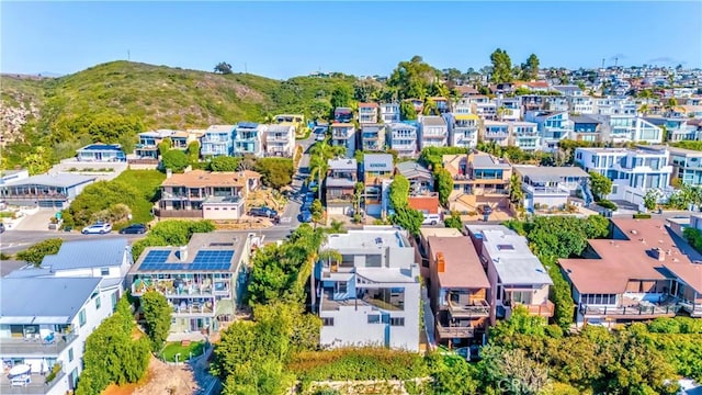 drone / aerial view featuring a mountain view