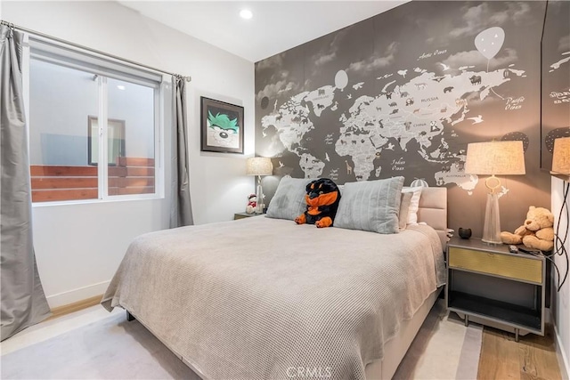 bedroom featuring light hardwood / wood-style floors