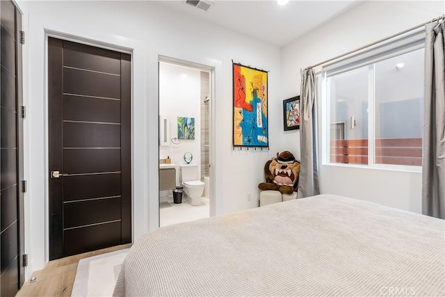 bedroom with ensuite bath