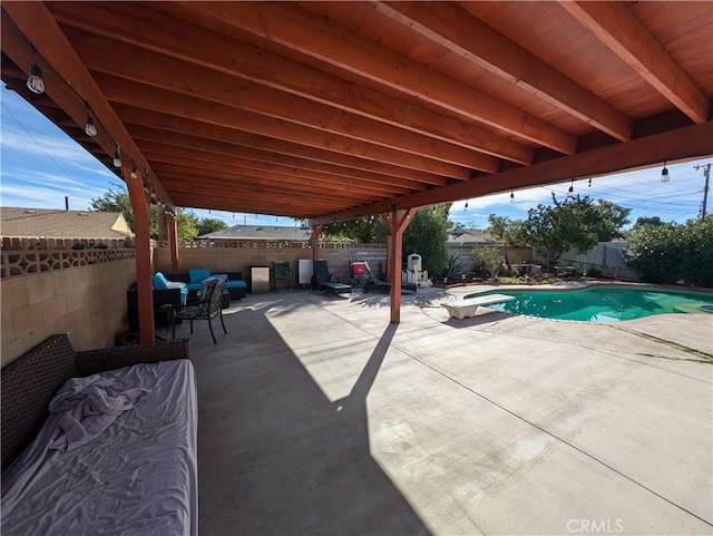 view of pool featuring a patio area