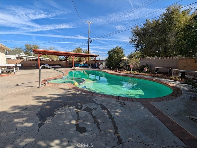 view of pool featuring a patio