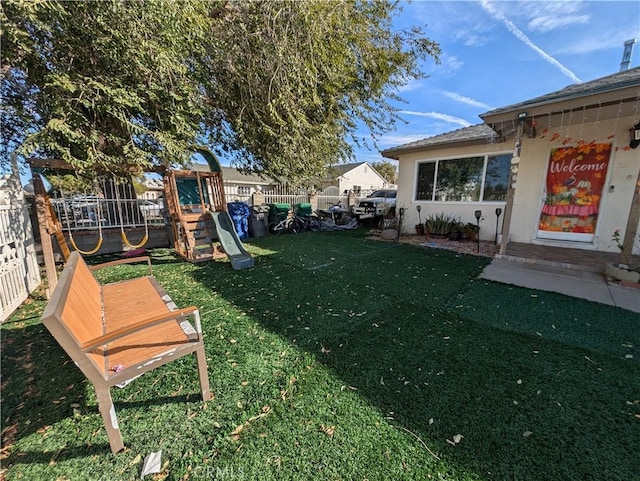 view of yard with a playground