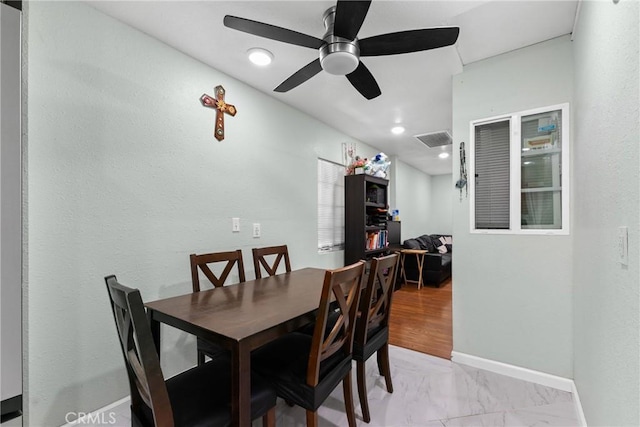 dining area featuring ceiling fan